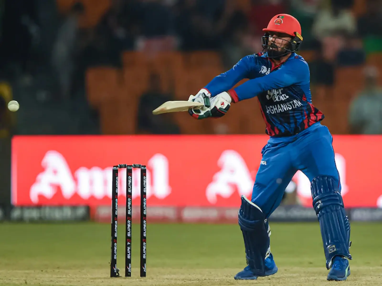 Afghanistan set India a target of 159 runs thanks to Mohammad Nabi's powerful batting; Akshar and Mukesh both claimed two wickets