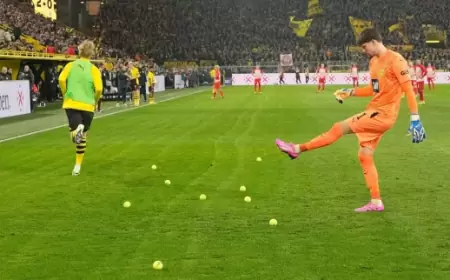 Unique protest by spectators in football match, tennis balls and chocolate coins thrown on the field